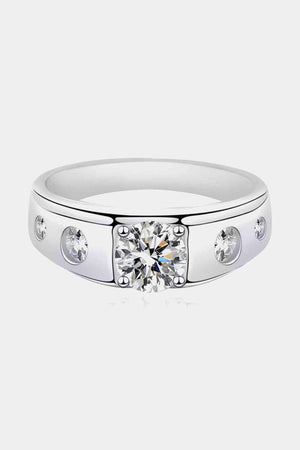 a white gold ring with a single diamond