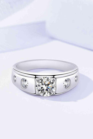 a white gold ring with diamonds on a white background