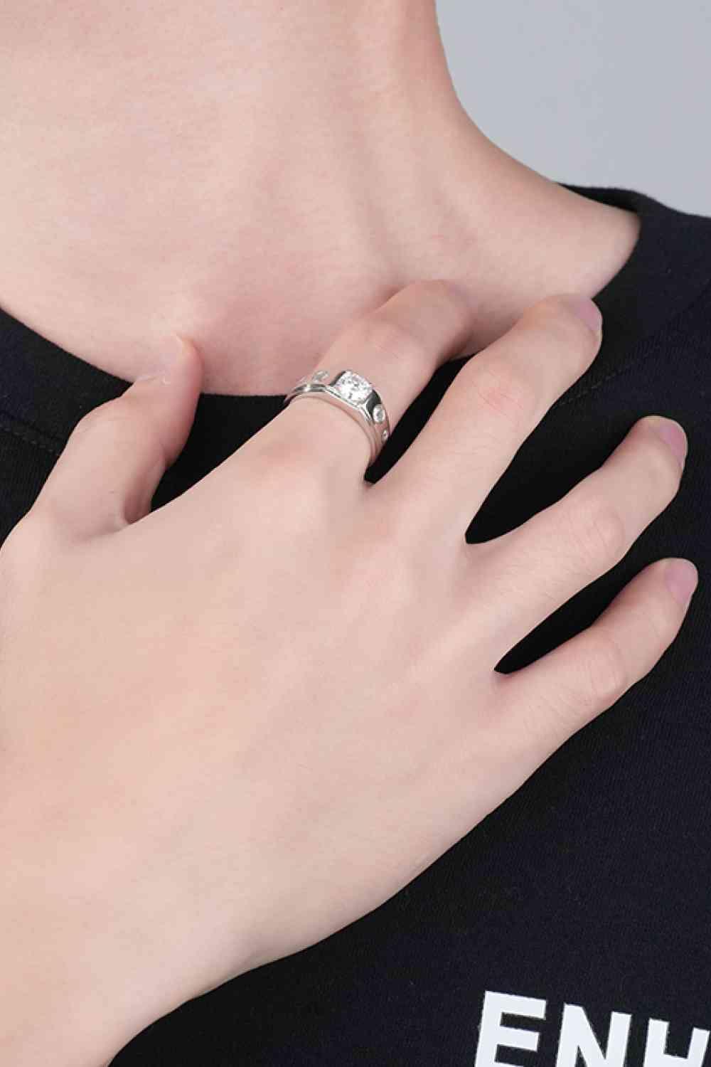 a woman's hand with a ring on it