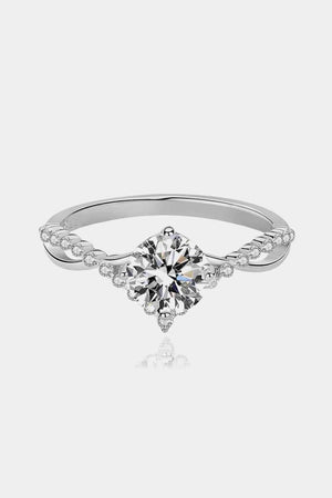 a diamond engagement ring with a twisted band