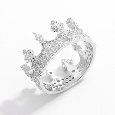 a silver ring with a crown on top of it