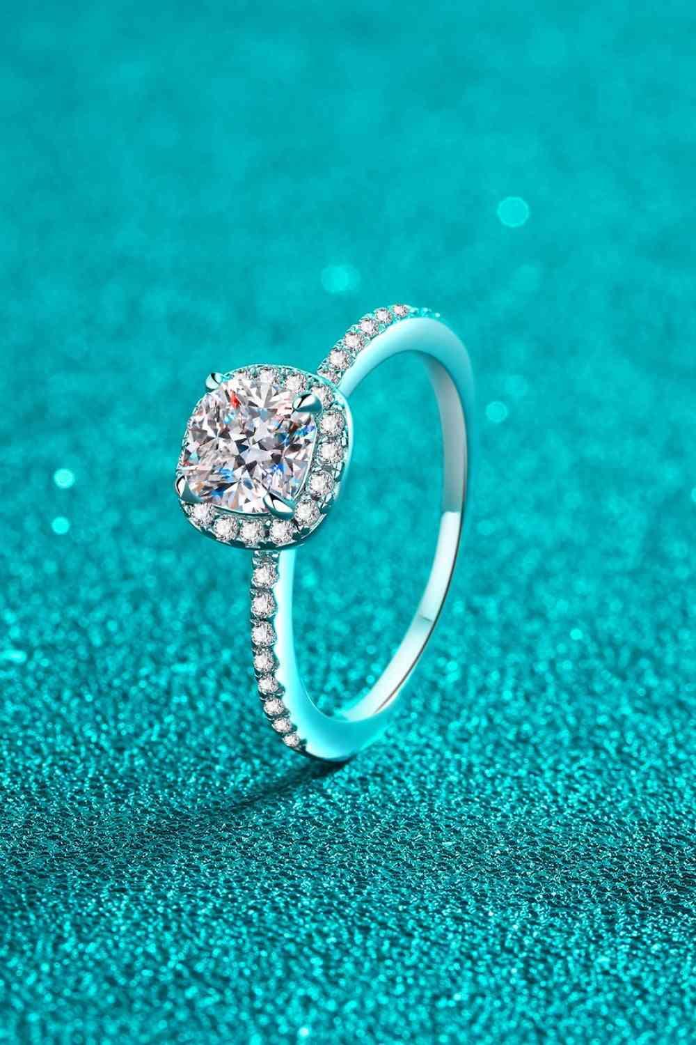 a diamond ring on a blue background