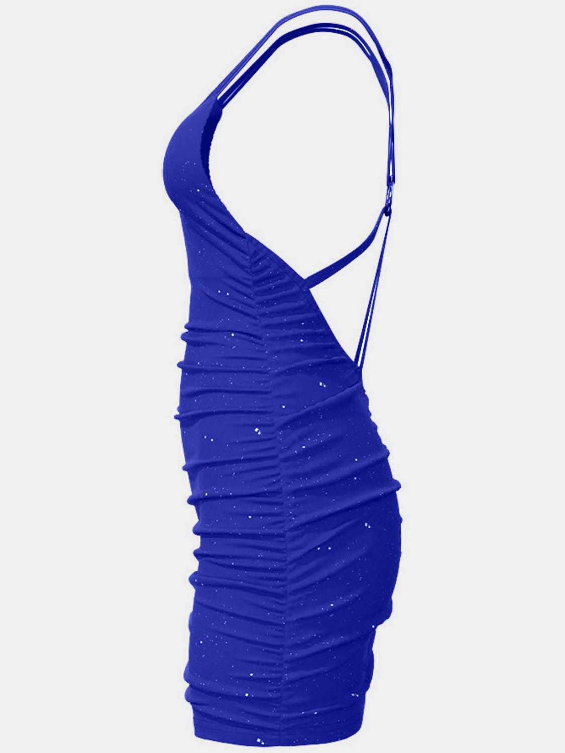 a woman's blue dress on a white background