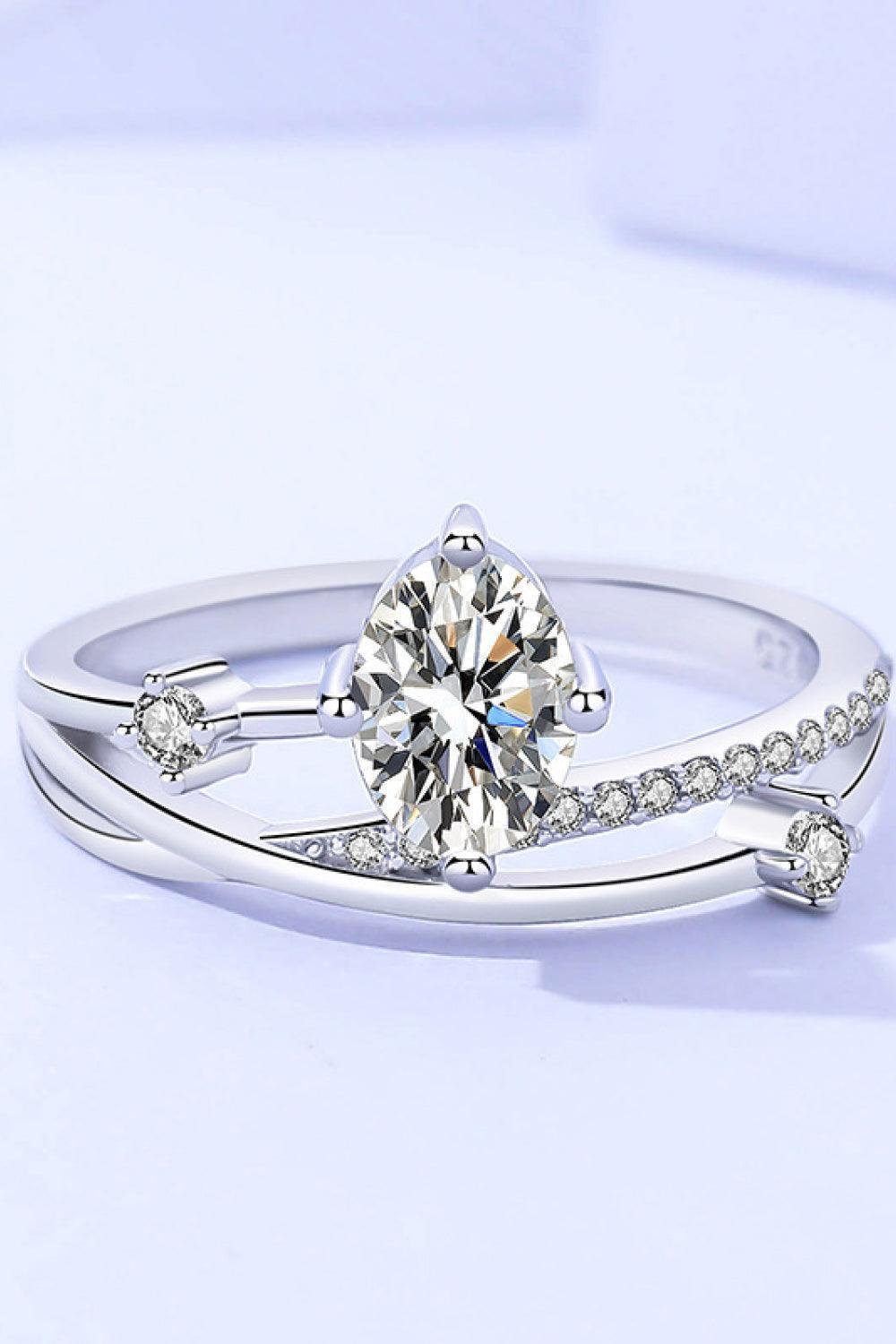 Glitzy Crisscross Platinum-Plated Oval Moissanite Ring - MXSTUDIO.COM