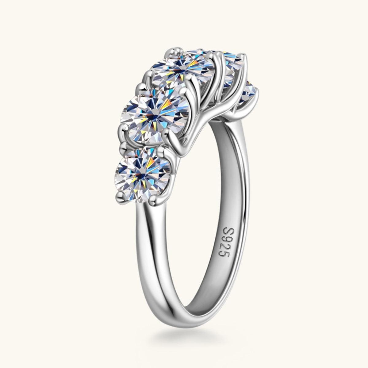a three stone engagement ring with three diamonds