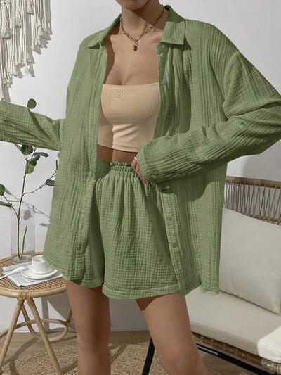 a woman wearing a green jacket and shorts