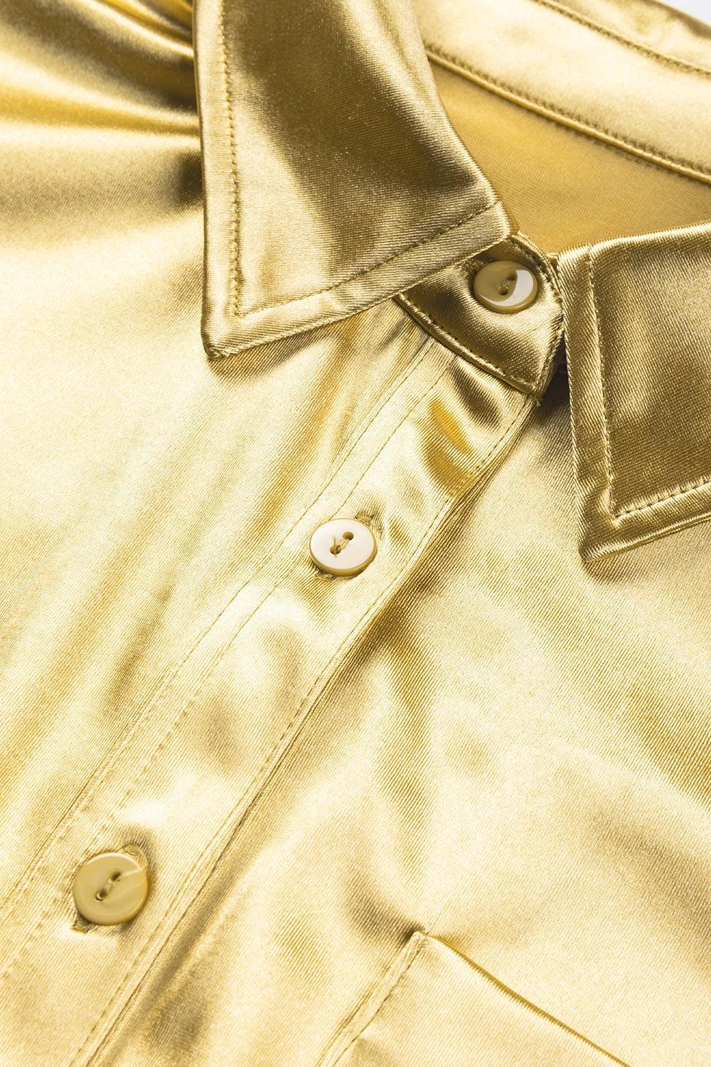 a close up of a gold shirt with buttons