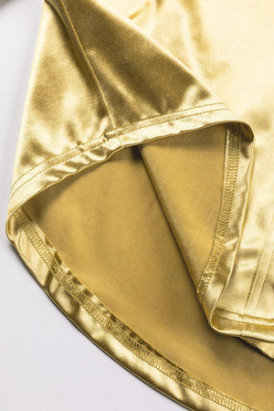a close up of a gold satin material
