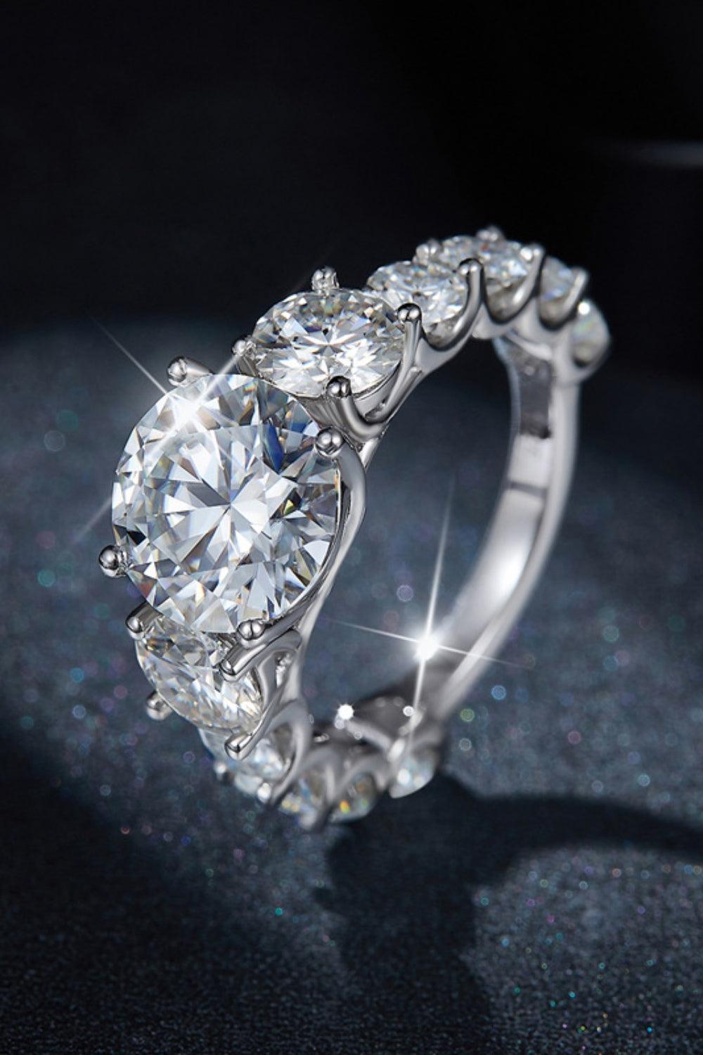 a diamond ring with three stones on it