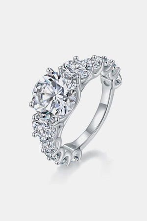a white gold engagement ring with three stones