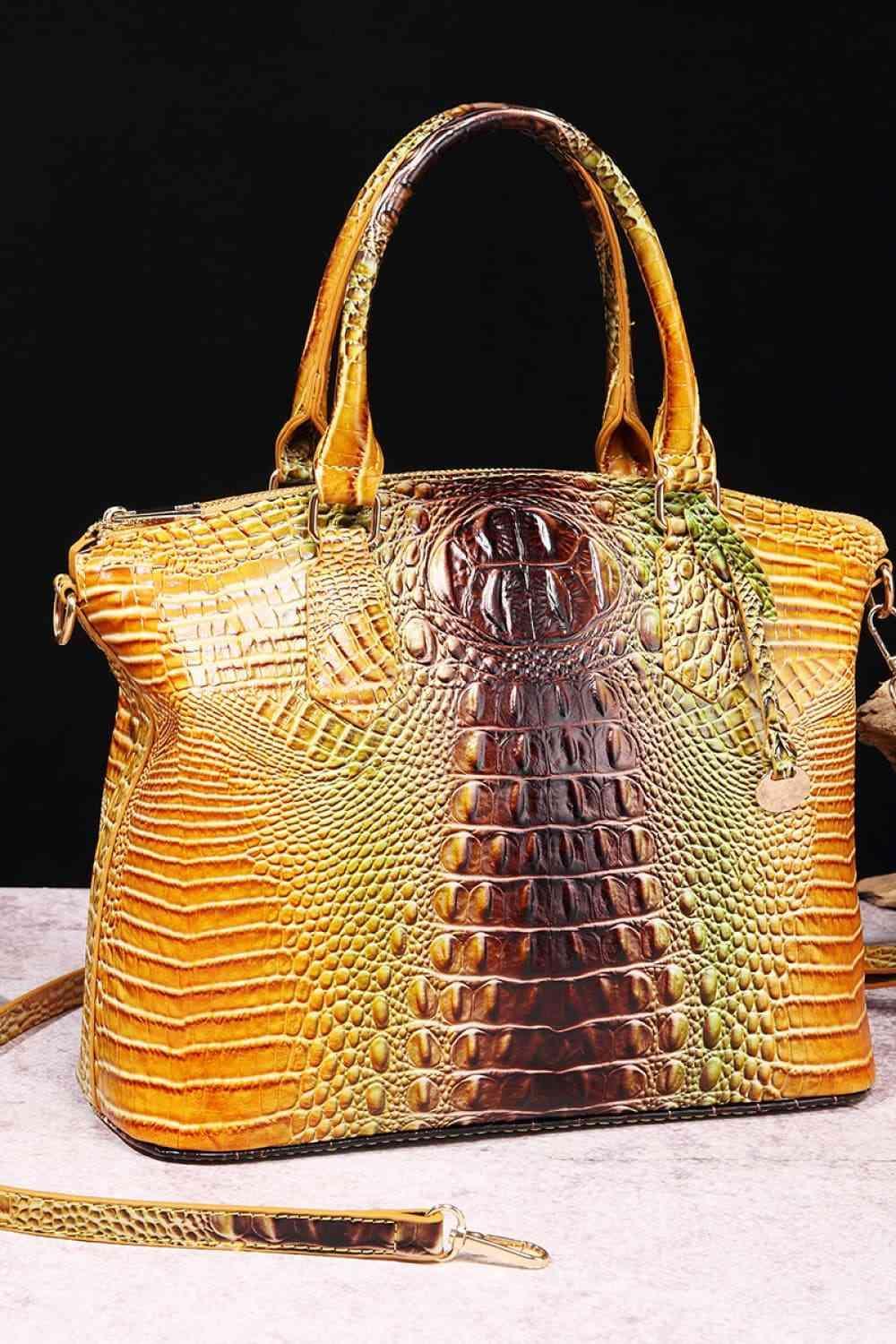 a brown and yellow purse sitting on top of a table