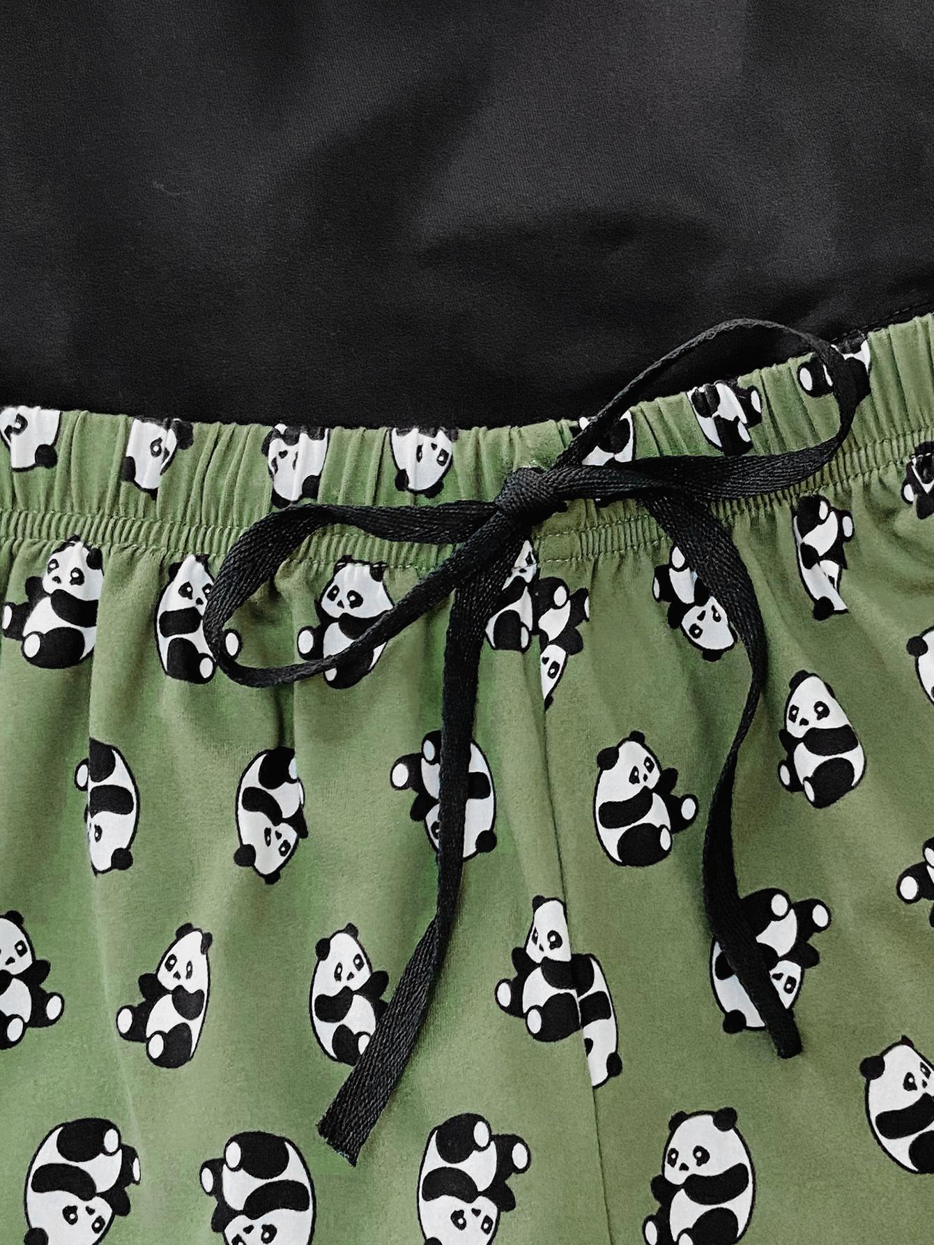 a close up of a pair of shorts with pandas on them