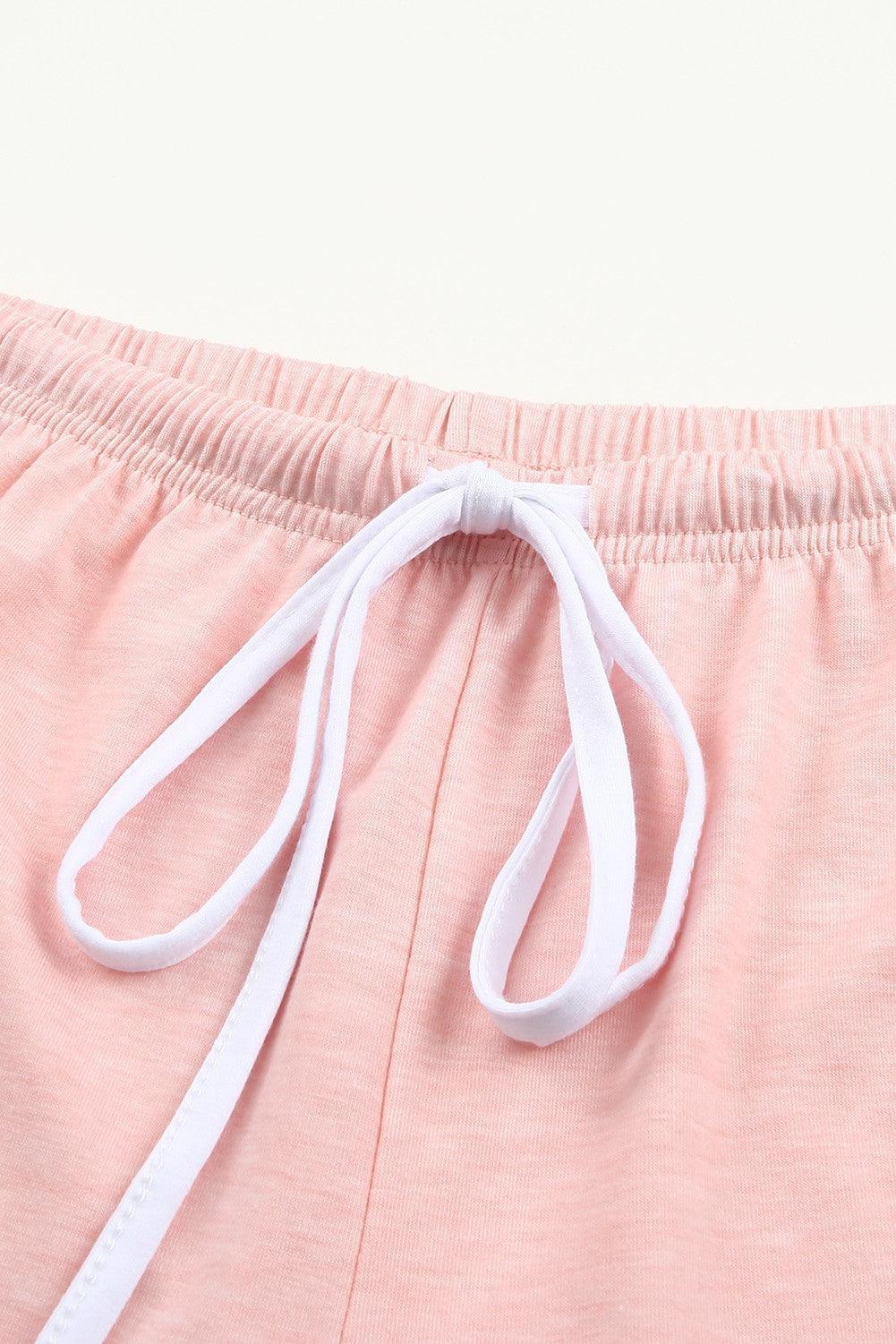 a close up of a pair of pink shorts