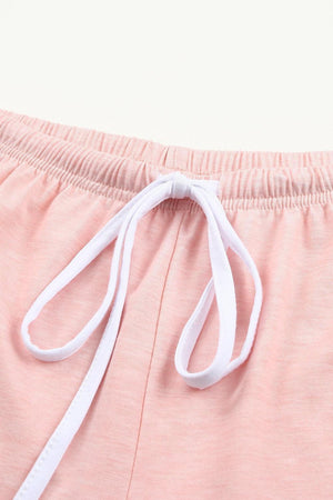 a close up of a pair of pink shorts