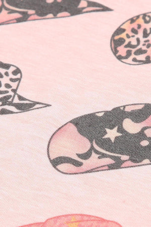 a close up of a pattern on a pink background