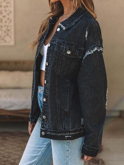 a woman wearing a denim jacket and jeans