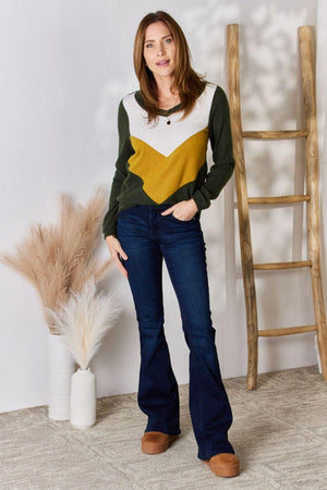 a woman standing in front of a ladder