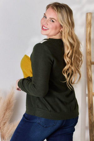 a woman standing next to a wooden ladder