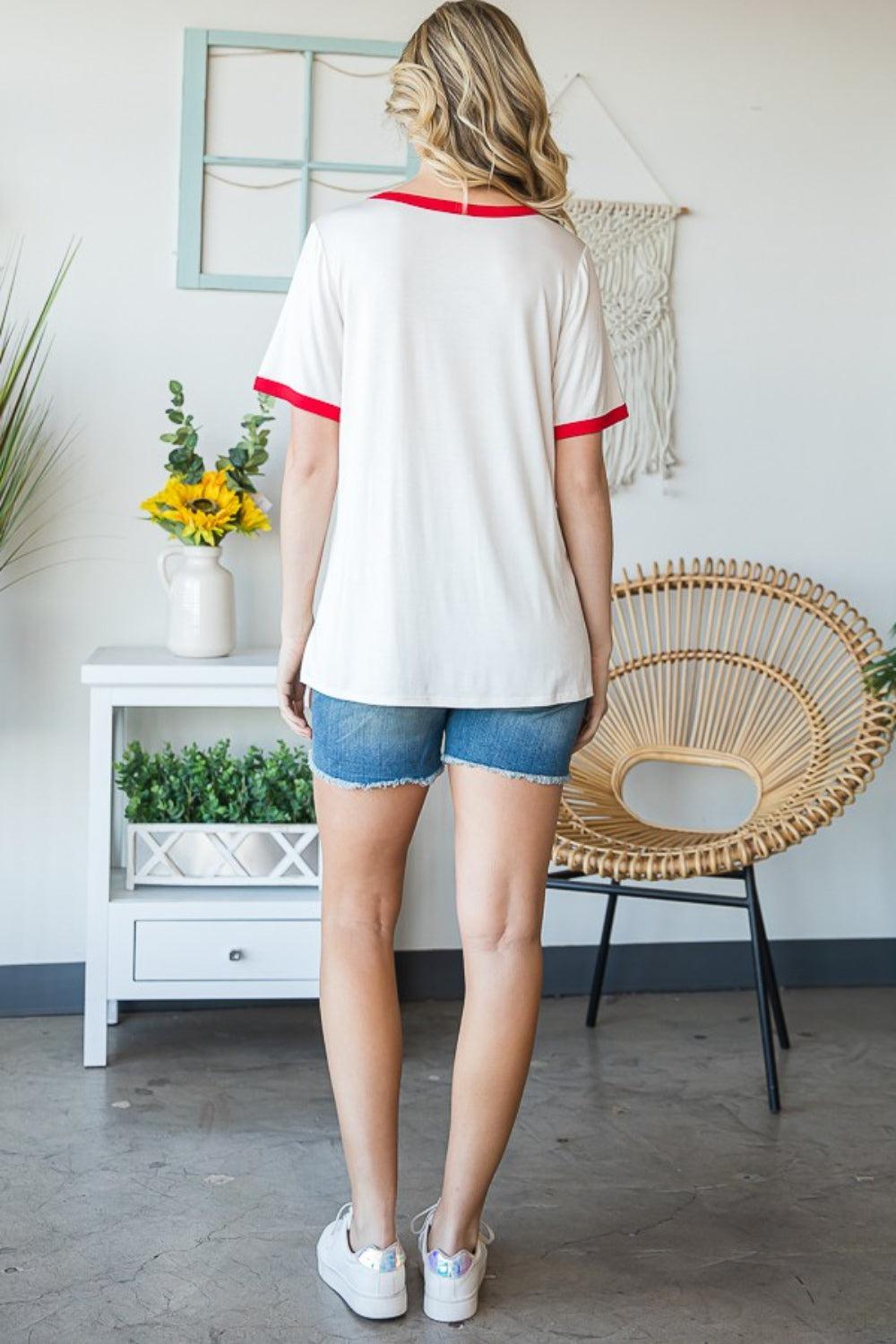 a woman standing in front of a chair