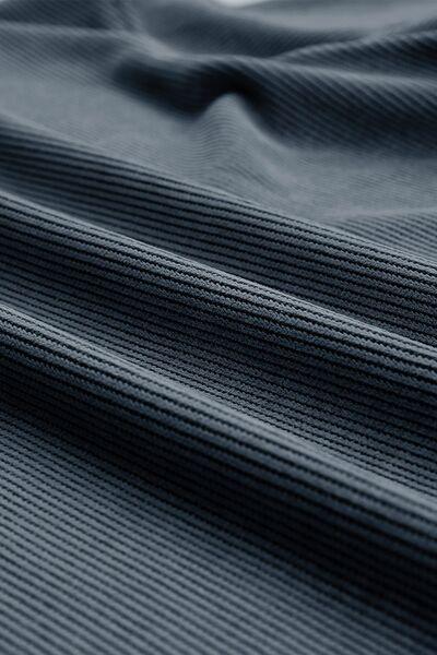 a close up view of a blue fabric