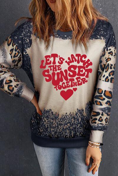 a woman with long hair wearing a sweater that says let's into the sunset