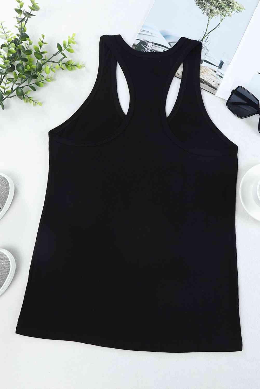 a women's black tank top with cutouts on the back