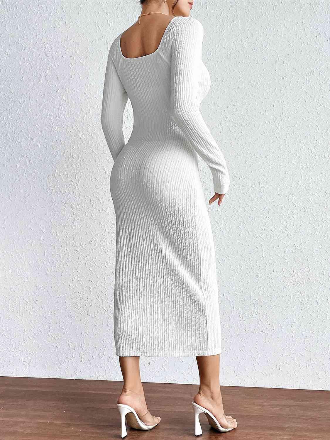a woman in a white sweater dress