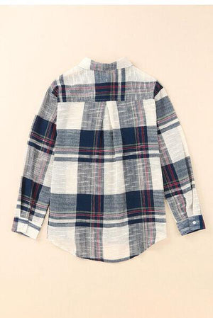 a white and blue plaid shirt on a beige background