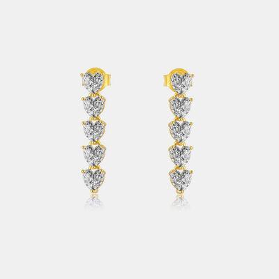 a pair of gold and diamond earrings