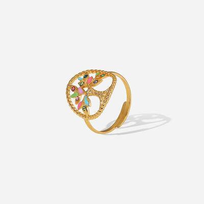 a gold ring with colorful stones on it
