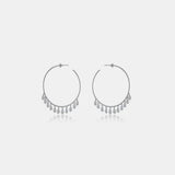 a pair of silver hoop earrings