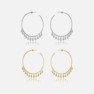 three pairs of gold and silver hoop earrings