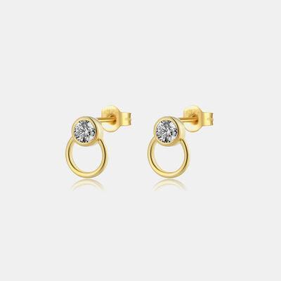 a pair of gold earrings with a diamond