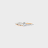 a gold and white diamond ring on a white background