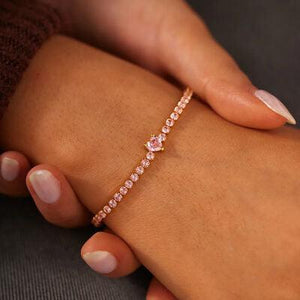 a close up of a person wearing a bracelet