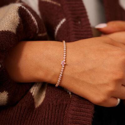 a close up of a person wearing a bracelet