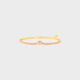 a yellow bracelet with a star on it