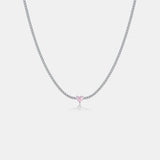 a necklace with a pink heart on it