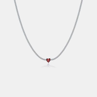 a necklace with a heart on a chain