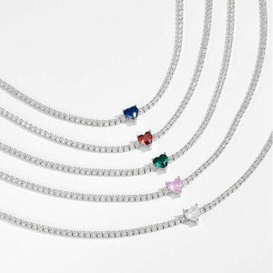 a set of four necklaces with different colored stones