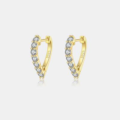 a pair of yellow gold earrings with diamonds