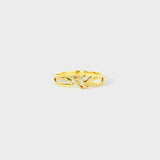 a gold ring with a single diamond