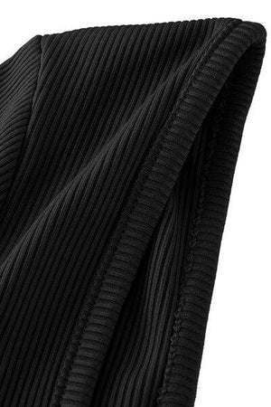 a close up of a black rib knit fabric