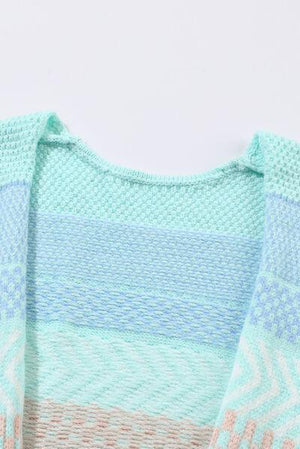 a knitted sweater with a blue and pink stripe