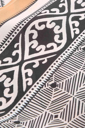 a close up of a black and white cloth