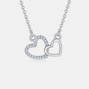 two hearts necklace with diamonds on a chain