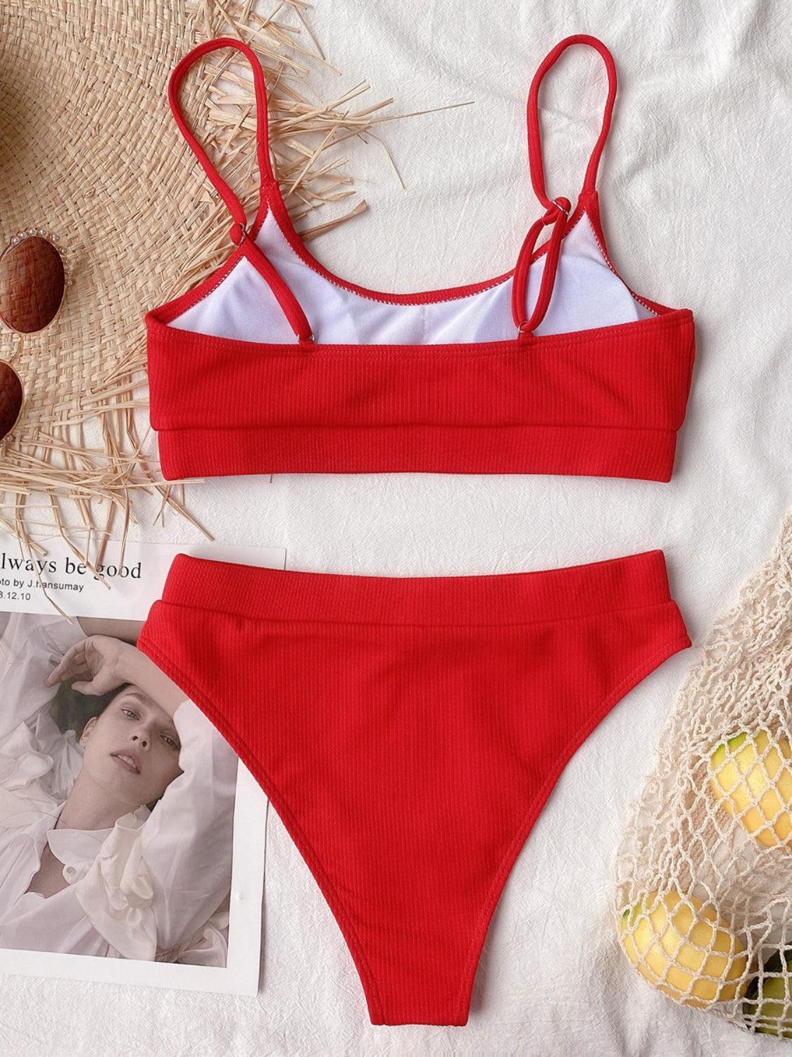 a red and white bikinisuit with a picture of a woman