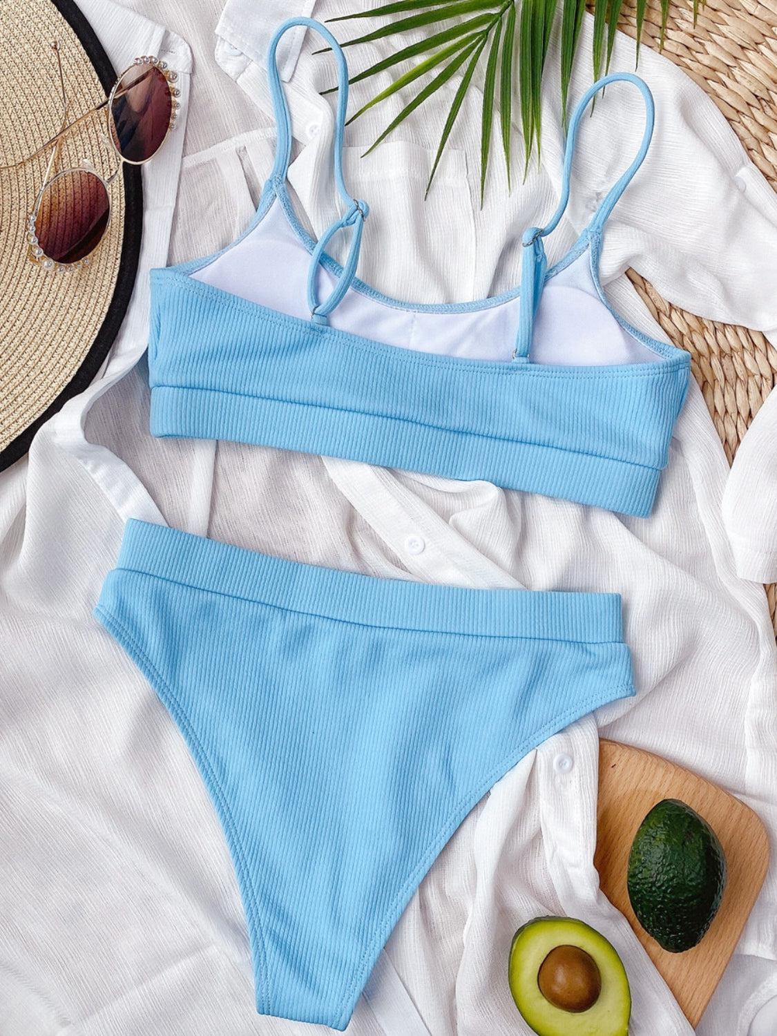 two pieces of blue and white swimsuit with an avocado