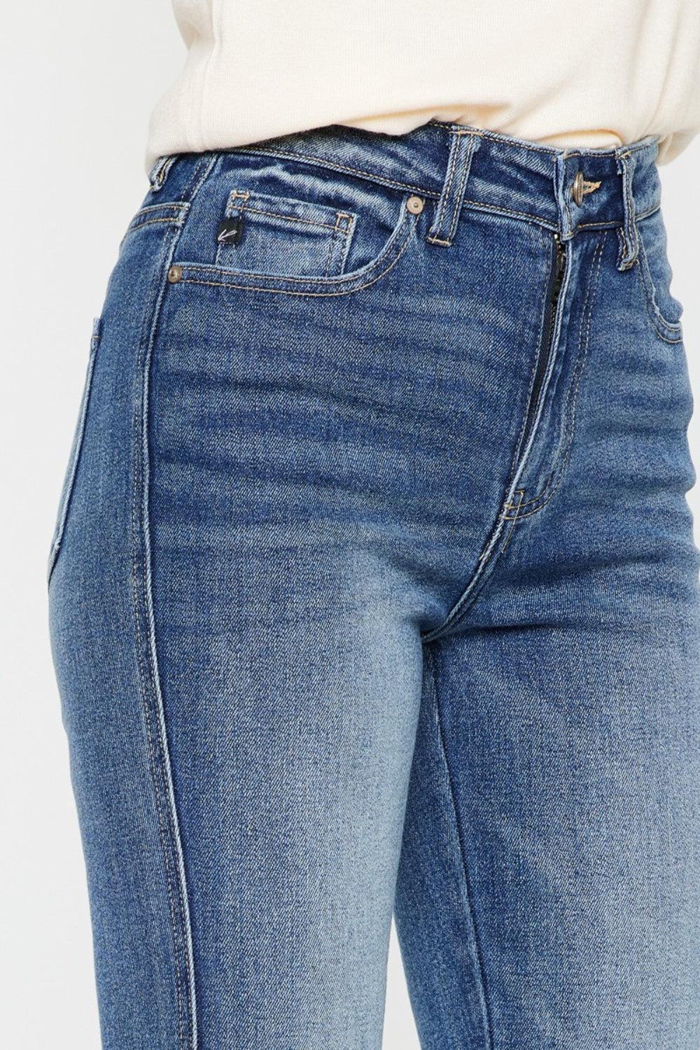 a close up of a person wearing jeans