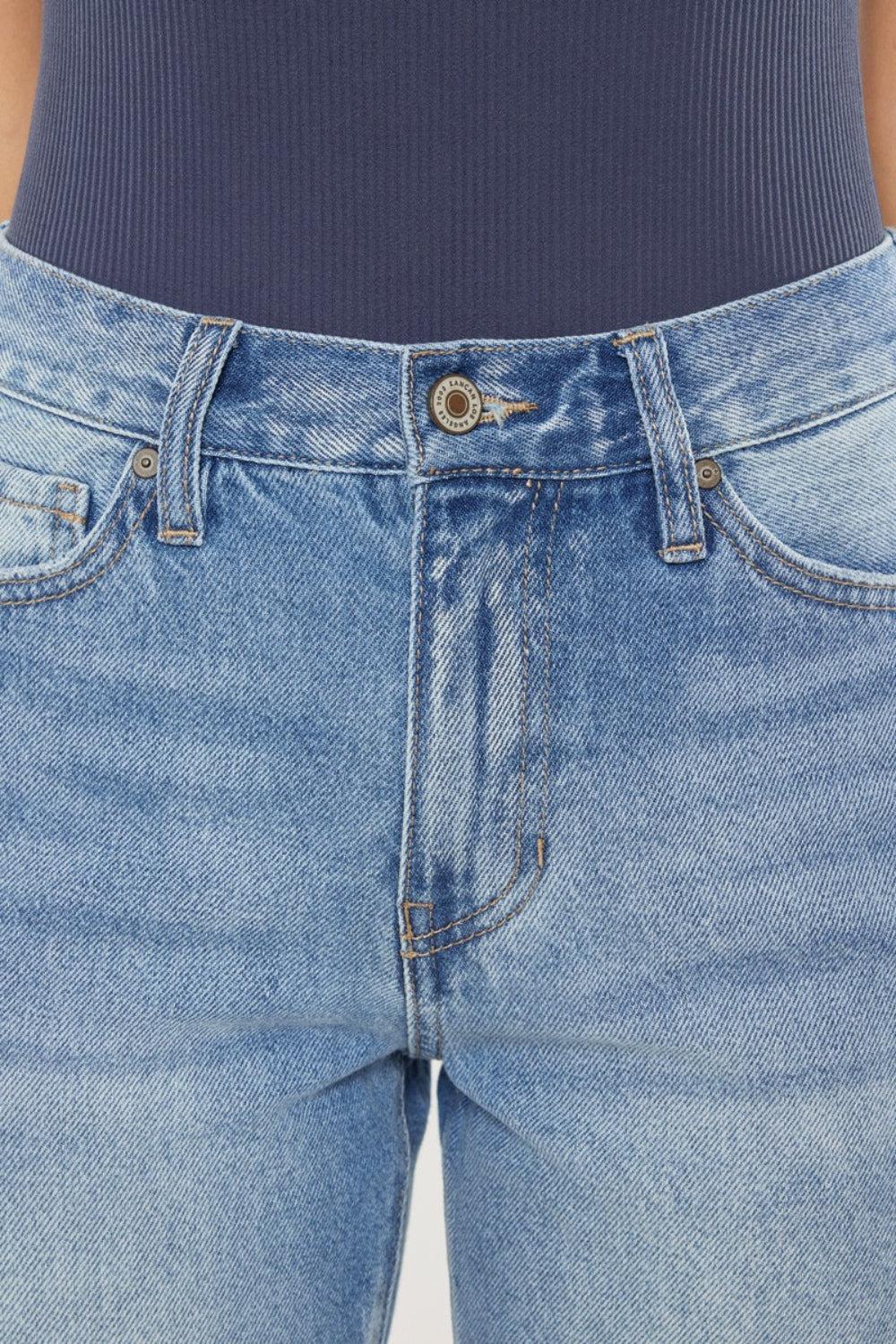 a close up of a person wearing jeans